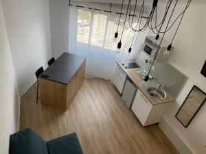 Köök või kööginurk majutusasutuses CAPAO Beach Hôtel
