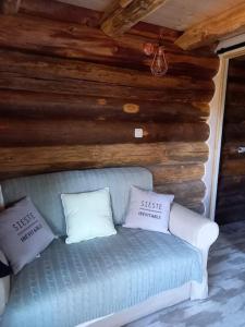 Ein Bett oder Betten in einem Zimmer der Unterkunft Les Petites Fustes Dans La Prairie