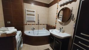 Kúpeľňa v ubytovaní apartament AWA Bajkowe Kołobrzeg