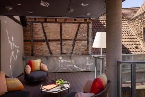 Posezení v ubytování Hotel Le Pavillon 7