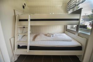 Postel nebo postele na pokoji v ubytování Sjølund house