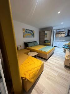 Postel nebo postele na pokoji v ubytování Guesthouse Dauti