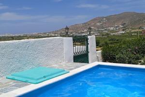 a villa with a swimming pool with a view at Studio Angelika in Glinado Naxos +72 photos