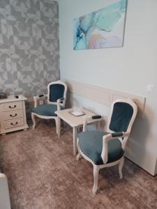 Posezení v ubytování Hotel Coroana