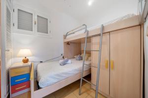 Postel nebo postele na pokoji v ubytování Hauzify I Apartament Joy