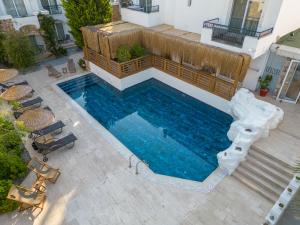 an overhead view of a swimming pool in a house at Costa Sariyaz Hotel Bodrum in Bodrum City