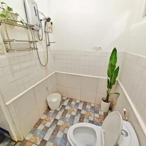 Koupelna v ubytování Pukaw Guesthouse with AC,private bathroom,wifi,common kitchen,great loc