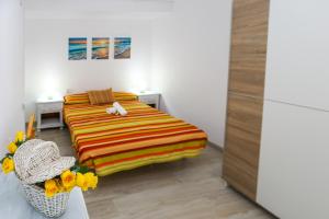 Posteľ alebo postele v izbe v ubytovaní Punta Prima Roma Planet Costa Dorada + 15 fotografií