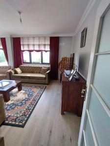 Χώρος καθιστικού στο DOGA&HUZUR Tek kat daire