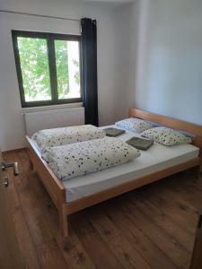 Postel nebo postele na pokoji v ubytování Apartment Ivan-Experience Elite
