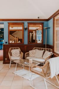 Posezení v ubytování Hôtel Le Romantica