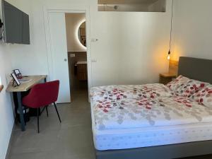 Postel nebo postele na pokoji v ubytování B&B NALÙ