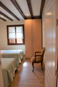 Postel nebo postele na pokoji v ubytování Peritxenea Landa Apartamentuak