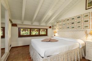 A bed or beds in a room at La Cucchetta