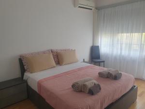 Postel nebo postele na pokoji v ubytování Lugano-Dino Panoramic Flat 5guests