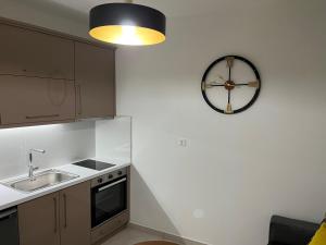 Kuchyň nebo kuchyňský kout v ubytování Alpha Apartment