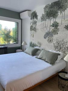 Postel nebo postele na pokoji v ubytování 3 Piéces confort climatisé vue mer, 4 personnes à Saint-Jean Cap Ferrat à proximité de monaco et menton