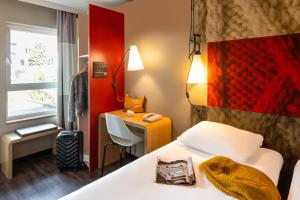 Postel nebo postele na pokoji v ubytování ibis Leuven Centrum