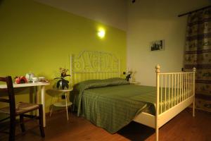 Postel nebo postele na pokoji v ubytování Maison Lombard