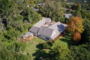 an aerial view of a house in the woods at bWhale guest house in Knysna