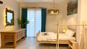 Postel nebo postele na pokoji v ubytování Cozy Design Flat in the heart of Antalya