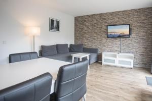 Posezení v ubytování Appartement Brink Fichtenweg 41