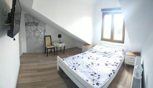 Telewizja i/lub zestaw kina domowego w obiekcie Lawendowy Dworek