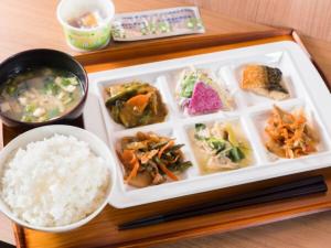 a tray of food with rice and other foods at Super Hotel Tokyo Kinshicho Ekimae / Vacation STAY 78884 in Tokyo