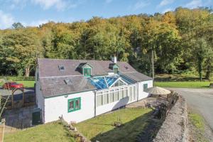 an aerial view of a house with a swimming pool at The Mill Nant Alyn in Rhydymwyn
