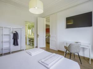 Posteľ alebo postele v izbe v ubytovaní SibsBcn-Paseo de Gracia Luxury Exclusive Gaudí