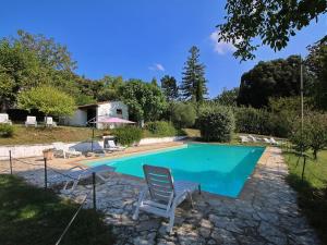 The swimming pool at or close to Attractive apartment in old farmhouse on the estate with pool