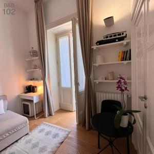 Ένα ή περισσότερα κρεβάτια σε δωμάτιο στο B&B 102