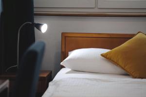 Posteľ alebo postele v izbe v ubytovaní Hotel Na Skarpie - Charzykowy