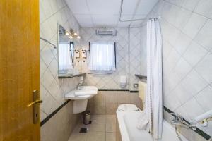 Kúpeľňa v ubytovaní Hotel Vicko