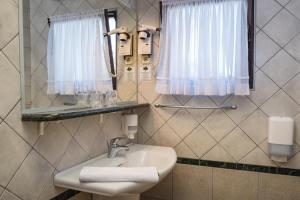 Kúpeľňa v ubytovaní Hotel Vicko