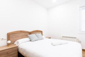 Katil atau katil-katil dalam bilik di Bonito y cómodo apartamento cerca de la playa