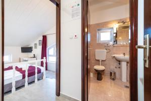 Kúpeľňa v ubytovaní Hotel Vicko
