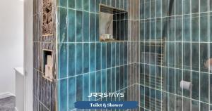 a building being remodeled with blue tile on it at Dudley - Stylish 3 Bedroom Sleeps 6 Wi-Fi - JRR Stays in Woodside +39 photos