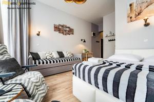 Postel nebo postele na pokoji v ubytování Baltic Apartments - Willa Carmen