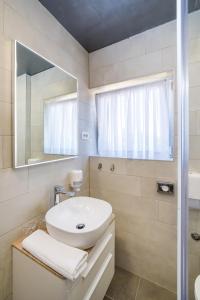 Kúpeľňa v ubytovaní Hotel Vicko