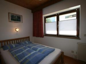 Postel nebo postele na pokoji v ubytování Apartment Peter by Interhome