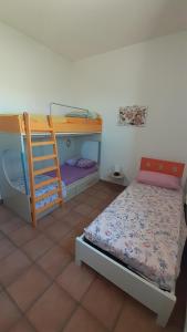 Postel nebo postele na pokoji v ubytování b&b Stella marina torre guaceto
