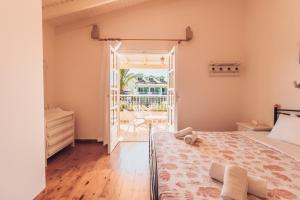 Postel nebo postele na pokoji v ubytování Valentino Corfu + 37 fotografií