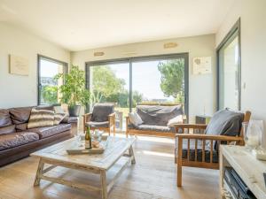 A seating area at Holiday Home Hidel - TRP101 by Interhome