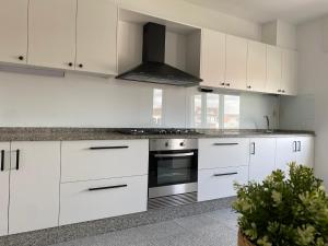 Η κουζίνα ή μικρή κουζίνα στο A Xaneiriña +8 φωτογραφίες