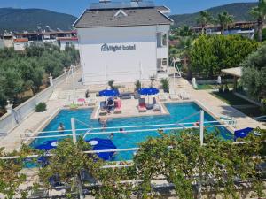 an overhead view of a swimming pool at a resort at Delight Boutique Hotel in Akbük