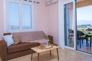 Posezení v ubytování Amaltheia Apartment