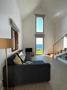 Ένα ή περισσότερα κρεβάτια σε δωμάτιο στο CASAS DO LARANJO- Cottages & Infinity Pool +59 φωτογραφίες