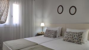 Posteľ alebo postele v izbe v ubytovaní Dennis Cozy Apartment near the Beach