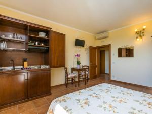 A kitchen or kitchenette at Apartment Tipologia Mono-8 by Interhome